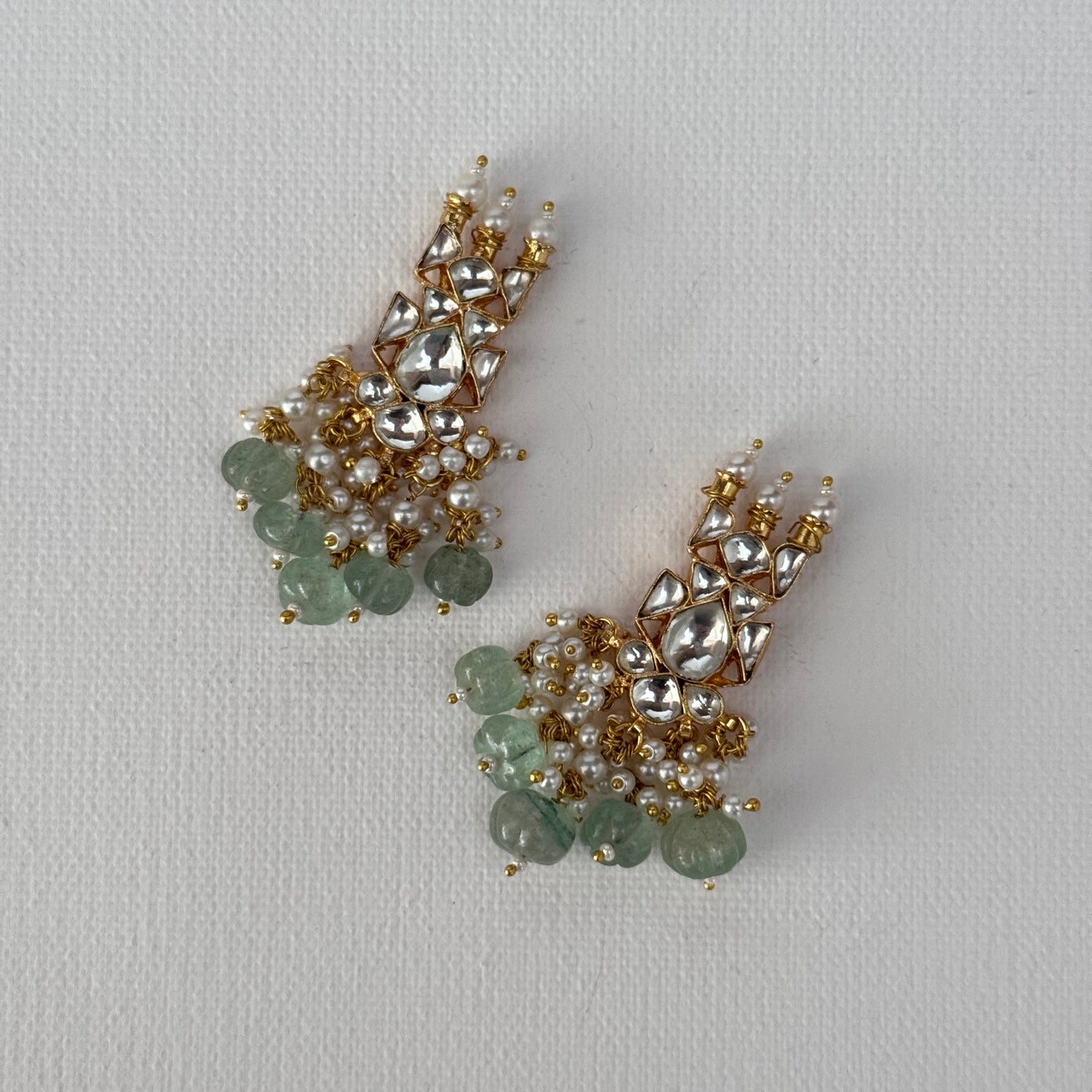 The Nyra Mint Dynasty Set - close-up of mint gemstones and pearls